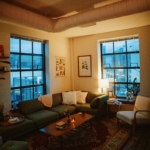 a living room filled with furniture and a fire place