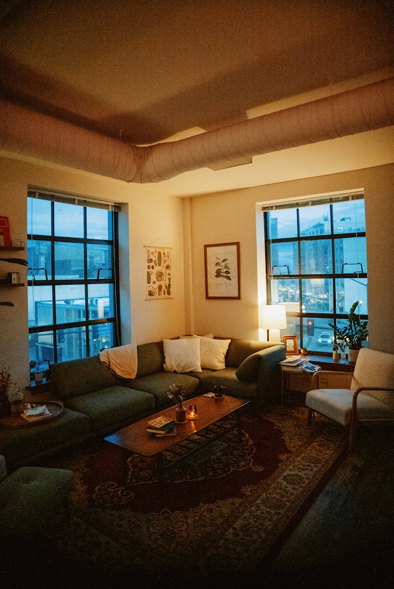 a living room filled with furniture and a fire place