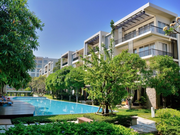 green trees near swimming pool during daytime